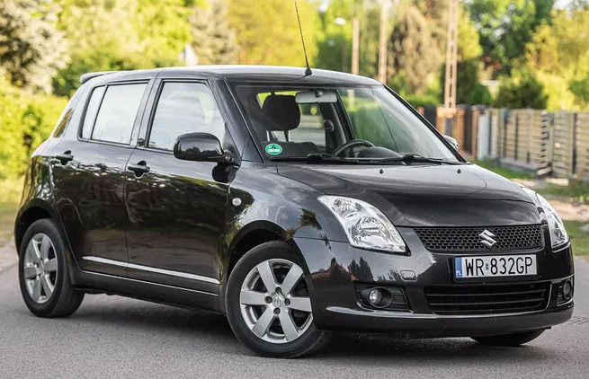 samochody osobowe Suzuki Swift cena 18900 przebieg: 174000, rok produkcji 2009 z Ozimek